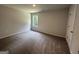 Bedroom featuring neutral walls and carpet, illuminated with natural light at 140 Tye St, Stockbridge, GA 30281