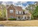 Charming two-story home with stone accents, inviting front porch, and well-maintained lawn at 270 Sturgess Run, Sharpsburg, GA 30277