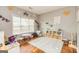 Bright playroom with hardwood floors, natural light, and a variety of toys at 270 Sturgess Run, Sharpsburg, GA 30277