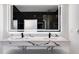 Bathroom featuring a floating double vanity with marble countertop and large mirror with integrated lighting at 859 N Bay Overlook, Villa Rica, GA 30180