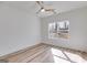 Bright bedroom featuring a modern ceiling fan, natural light and stylish wood-look floors at 859 N Bay Overlook, Villa Rica, GA 30180