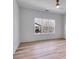 Bright bedroom with ceiling fan, large windows providing natural light and views of the backyard at 859 N Bay Overlook, Villa Rica, GA 30180