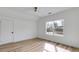 Bedroom with large window providing natural light and ceiling fan at 859 N Bay Overlook, Villa Rica, GA 30180