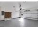 Spacious garage with epoxy floors, storage system, and an automatic garage door at 859 N Bay Overlook, Villa Rica, GA 30180