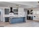 Beautiful kitchen featuring gray cabinets, a marble island, and stainless steel appliances at 859 N Bay Overlook, Villa Rica, GA 30180