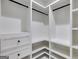 Spacious walk-in closet provides ample storage with shelves, drawers, and hanging rods at 859 N Bay Overlook, Villa Rica, GA 30180
