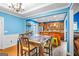 Dining room with hardwood floors, connecting living room and kitchen for easy access at 1273 Boulevard Lorraine Sw, Atlanta, GA 30311