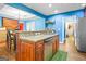 Spacious kitchen featuring a large island with granite countertops and stainless steel appliances at 1273 Boulevard Lorraine Sw, Atlanta, GA 30311