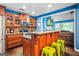 Well-equipped kitchen with custom wood cabinetry, granite counters, and stainless steel appliances at 1273 Boulevard Lorraine Sw, Atlanta, GA 30311