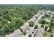 Scenic view of neighborhood featuring manicured lawns, dense trees and community pool at 1406 Bayrose Cir # 6B, East Point, GA 30344