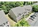 A high angle view of townhomes surrounded by lush greenery and well-maintained landscaping at 1406 Bayrose Cir # 6B, East Point, GA 30344