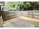 Small backyard featuring a concrete patio and wood privacy fence at 1406 Bayrose Cir # 6B, East Point, GA 30344
