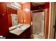 Bathroom with a vanity, mirror, and enclosed shower with tile surround at 1406 Bayrose Cir # 6B, East Point, GA 30344