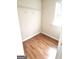 Inside the closet, showcasing wood floors, wire shelving and a window at 1406 Bayrose Cir # 6B, East Point, GA 30344
