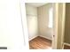 Empty closet features wood floors, wire shelving, and natural light at 1406 Bayrose Cir # 6B, East Point, GA 30344