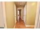 Hallway features wood floors and multiple doorways leading to other rooms at 1406 Bayrose Cir # 6B, East Point, GA 30344