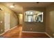 Open-concept living room with hardwood floors and a view into the kitchen at 1406 Bayrose Cir # 6B, East Point, GA 30344