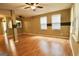 Hardwood floors complement this spacious living room with plenty of natural light at 1406 Bayrose Cir # 6B, East Point, GA 30344