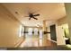 Open-concept living room with bright windows, hardwood floors, and modern ceiling fans, creates a welcoming atmosphere at 1406 Bayrose Cir # 6B, East Point, GA 30344