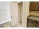 Walk-in pantry provides ample storage with adjustable shelving for all your kitchen and household needs at 1406 Bayrose Cir # 6B, East Point, GA 30344
