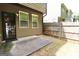 Back patio with fenced yard and door to the house at 1406 Bayrose Cir # 6B, East Point, GA 30344