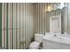 Charming bathroom with vanity, toilet, and neutral decor at 123 Stratmore Pl, Stockbridge, GA 30281