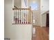 Elegant foyer featuring a staircase, hardwood floors, and a decorative window above front door at 123 Stratmore Pl, Stockbridge, GA 30281