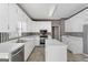 Kitchen featuring white cabinets, stainless steel appliances, and a kitchen island at 123 Stratmore Pl, Stockbridge, GA 30281