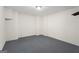 An empty room with neutral carpet, light and electrical outlets at 123 Stratmore Pl, Stockbridge, GA 30281