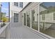 Exterior of the home featuring sliding glass doors leading to the deck at 930 Laurel Brooke Ave, Peachtree City, GA 30269
