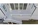 White deck with stairs leading to the backyard at 930 Laurel Brooke Ave, Peachtree City, GA 30269