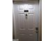 Apartment door with the unit number 4111, door knocker, and keypad lock at 4111 Pine Heights Ne Dr, Atlanta, GA 30324