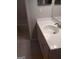 Bathroom featuring a white vanity, white countertop, chrome faucet and an adjacent bath tub at 4111 Pine Heights Ne Dr, Atlanta, GA 30324
