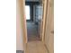 View from hall into bedroom featuring neutral carpet, french doors, and natural light from the windows at 4111 Pine Heights Ne Dr, Atlanta, GA 30324