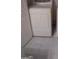 Laundry room featuring a white dryer and tiled floor at 4111 Pine Heights Ne Dr, Atlanta, GA 30324