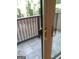Sliding glass doors leading to private patio. View of the outdoor space and fence at 4111 Pine Heights Ne Dr, Atlanta, GA 30324