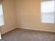 Bedroom shows neutral walls, carpeting, and large windows at 4000 Orchard Hill Ter, Stone Mountain, GA 30083