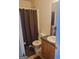 Bathroom featuring a shower, toilet, vanity, and mirror at 11714 Double Lake Xing, Fayetteville, GA 30215