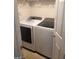 Laundry room featuring a new washer and dryer unit at 11714 Double Lake Xing, Fayetteville, GA 30215