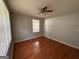 Bedroom featuring hardwood floors and lots of natural light at 47 Elm St, Hampton, GA 30228