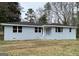Single story home with recent paint and updated windows at 47 Elm St, Hampton, GA 30228