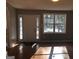 Inviting living room featuring hardwood floors, natural light, and a welcoming entrance at 47 Elm St, Hampton, GA 30228