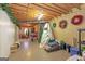 Unfinished basement area with holiday decorations, showing the space's potential for storage or customization at 245 Longshore Way, Fayetteville, GA 30215