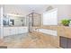 Luxurious bathroom with a soaking tub, a shower, and a double vanity with granite countertops at 245 Longshore Way, Fayetteville, GA 30215