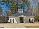A welcoming community clubhouse with a charming exterior, perfect for gatherings at 245 Longshore Way, Fayetteville, GA 30215