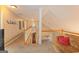 Open hallway showcasing the architecture of the home with staircase and upstairs loft at 245 Longshore Way, Fayetteville, GA 30215