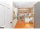 Open-concept kitchen with white cabinets and stainless-steel appliances at 245 Longshore Way, Fayetteville, GA 30215