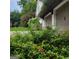 Beautiful landscaping accents this home's curb appeal, adding a touch of natural charm at 245 Longshore Way, Fayetteville, GA 30215