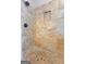 Beautifully tiled walk-in shower with pebble floor at 245 Longshore Way, Fayetteville, GA 30215