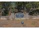 Stone entrance sign that welcomes you to Harbor Lakes, a lovely community at 245 Longshore Way, Fayetteville, GA 30215
